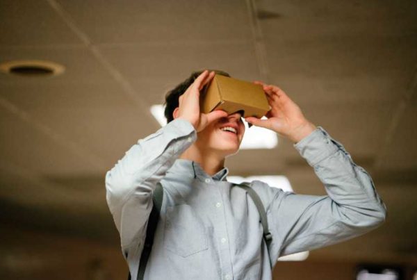 boy using VR goggles